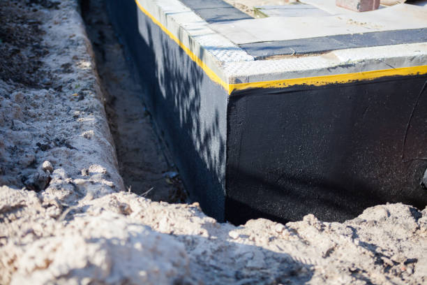 Professional Waterproofing technician working in Walkerville, MI